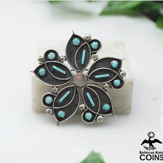 Metal: Silver (tested) Weight: 9.2 grams Measurements: 1.8" x 1.8" (Length x Width) *Discover a unique piece of history with this Native American Silver & Turquoise Floral Bohemian Brooch Pendant, a timeless treasure for any jewelry collection. Handcrafted with attention to detail, this beautiful piece features delicate turquoise detailing and is sure to bring classic elegance to your look. Be inspired by the history behind this beautiful piece! *P L E A S E* S E E* P H O T O S!! Artisan Collectible Jewelry Brooch, Handmade Turquoise Brooches For Collectible, Tacoma Wa, Timeless Treasures, Silver Turquoise, Classic Elegance, Be Inspired, The History, Brooch Pin