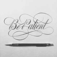 the word be patient written in cursive writing on a piece of paper with a pen