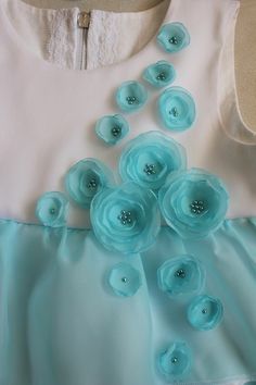 a dress with blue flowers on it