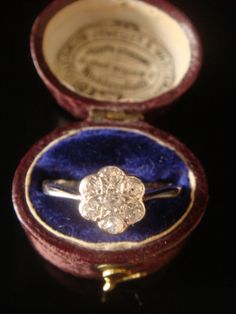 This is a beautiful Edwardian ring sitting seven very fine natural and tested old cut Diamonds, in a cluster fashion. #crispinjewellery #engagement Edwardian Diamond Ring, Edwardian Ring, Fine Jewelery