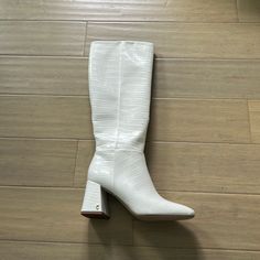 Never Worn, Has Like Stretchy Material By Zipper So Size Is Adjustable In That Sense Wide Calf Synthetic Heeled Boots With Almond Toe, Synthetic Wide Calf Heeled Boots With Almond Toe, White Leather Heeled Boots With Wide Calf, White Faux Leather Heeled Boots With Round Toe, White Leather Heeled Boots For Wide Calf, White Leather Wide Calf Heeled Boots, White Synthetic Boots For Formal Occasions, White Almond Toe Heels In Faux Leather, Synthetic Boots With Stacked Heel And Almond Toe