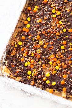 a baking dish filled with chocolate and candy