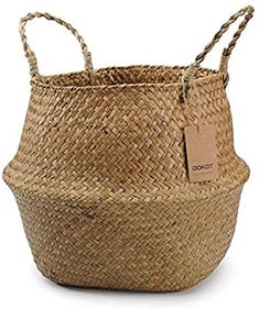 an empty basket with a tag hanging from it's handle and the handles are made out of straw