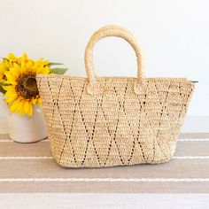 IN STOCK NOW SHIPPING FROM LOS ANGELES Introducing the Elena Handbags Hand Woven Fashion Raffia Top Handle Beach Bag! Perfect for any beach getaway, this bag combines fashion and function with its hand woven raffia material and convenient top handle. Carry all your essentials in style with this must-have accessory. Natural Soft Raffia Straw Handmade Lined Size: 10"H x 16"W x 6’‘D Designer Style ID: 8694 Beach Getaway, Woven Raffia, Straw Bags, Raffia Bag, Beach Getaways, Denim Bag, Designer Style, 6 D, Knitted Bags