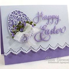 a purple and white greeting card with an easter egg