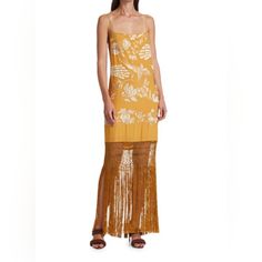 Johanna Ortiz Yellow Ochre Size: 4 Nwt! Hard To Find! Tropical Embroidering Is Woven Throughout This Airy Silk Slip Dress Before Falling To A Crochet Fringe Hem That Adds Playful Movement To The Maxi Silhouette. Squareneck Slim Straps Sleeveless Back Keyhole Tie Crochet Fringe Hem Embroidered Finish Silk Dry Clean Imported Size & Fit About 47" From Shoulder To Hem Model Measurements: 5'10" Tall Model Is Wearing A Us Size 4 Elegant Yellow Embroidered Dress, Spring Yellow Embroidered Maxi Dress, Spring Embroidered Yellow Maxi Dress, Yellow Embroidered Maxi Dress For Beach, Yellow Embroidered Maxi Dress For The Beach, Yellow Silk Beach Dress, Embroidered Yellow Beach Dress, Yellow Silk Maxi Dress For The Beach, Yellow Silk Vacation Dress