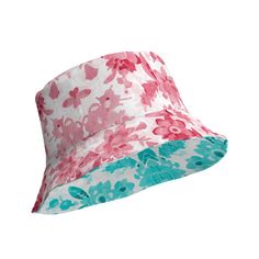 This Cerise and Teal Floral Reversible bucket hat can be worn on both sides, making it easy to match with different outfits. Made of breathable premium fabric, this hat will become your go-to streetwear accessory. * 100% polyester * Fabric weight: 8.1 oz/yd² (275 g/m²)  * Moisture-wicking and breathable fabric * Linen feel material * Reversible * Available in 2 sizes * Blank product components sourced from China Reversible Bucket Hat For Beach, Casual Reversible Bucket Hat, Trendy Reversible Brimmed Bucket Hat, Reversible Pink Bucket Hat For Beach, Reversible Wide Brim Bucket Hat For Spring, Spring Reversible Wide Brim Bucket Hat, Reversible Pink Bucket Hat For The Beach, Trendy Reversible Bucket Hat, Spring Wide Brim Reversible Bucket Hat