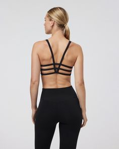 Classic medium-cut front with a strappy back, the Yosemite Sports Bra is up for adventure. Great for hiking, training and traveling. | Vuori Yosemite Bra | Black | XS Vuori makes premium performance apparel inspired by the active Coastal California lifestyle; an integration of fitness, surf, sport, and art. Breaking down the boundaries of traditional activewear, we are a new perspective on performance apparel. Breathable Strappy Athleisure Activewear, Breathable Strappy Functional Activewear, Breathable Strappy Activewear For Training, Functional Strappy Moisture-wicking Activewear, Functional Moisture-wicking Strappy Activewear, Sporty Strappy Breathable Activewear, Compressive Strappy Activewear, Sporty Nylon Activewear With Strappy Back, Compressive Strappy Activewear With Straps