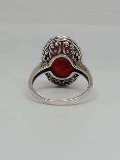 925 Silver Oval Carnelian Agate Ornate Underside Bezel Ring Size 10.5 Item w #25 Clean and in good condition Ring can be sized by your local jeweler Traditional Oval Carnelian Rings, Vintage Oval Carnelian Rings, Silver Oval Enamel Ring, Oval Red Carnelian Jewelry, Vintage Carnelian Hallmarked Ring, Luxury Carnelian Oval Cabochon Rings, Vintage Silver Carnelian Rings, Ornate Ring, Bezel Ring