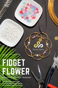 the front cover of fidgett flower magazine with beads, scissors and other crafting supplies