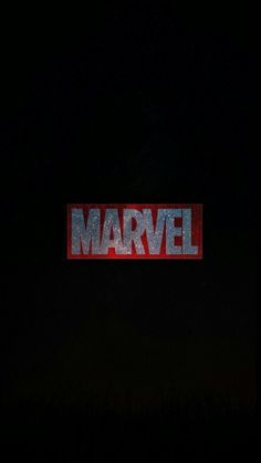 the word marvel is lit up in the dark