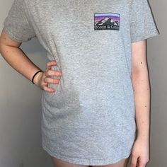 Ocean & Coast Grey T Shirt. Never Worn Heather Grey Short Sleeve Top With Graphic Print, Heather Grey Graphic Tee With Graphic Print, Heather Grey Graphic Tee With Print, Heather Grey Relaxed Fit Top With Screen Print, Grey T Shirt, Gray Tshirt, Shirt Color, Colorful Shirts, Womens Tops