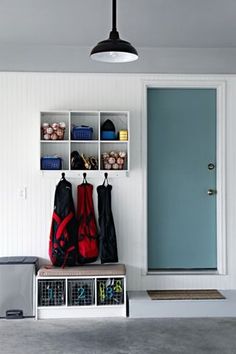 an image of a room with some bags on the shelf