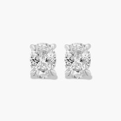 Platinum Oval Shape Diamond Stud Earrings (0.25 CTW - H-I / SI1-SI2). This pair of classic princess cut diamond earrings feature a tapered basket, showcasing the unique characteristics of a princess cut diamond. Linear, chunky flashes of light shimmer though out this dramatic geometric pattern. Princess Cut Diamond Earrings, Shimmer And Shine, Shimmer N Shine, Unique Characteristics, Diamond Stud Earrings, Diamond Stud, Princess Cut Diamonds, Diamond Earrings Studs, Diamond Studs