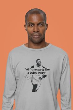 You know Bron Bron loves to party, and now you can join the fun with our "Ain't no party like a Diddy Party" t-shirt. This premium fitted Long sleeve Tee is a slam dunk for both comfort and style. Made from high-quality cotton, it's softer than a layup. With a classic fit and crew neckline, it's perfect for showing your support at the game or hitting a P. Diddy party. So, grab yours today and party like Akron's finest! 100% cotton Classic fit Sewn-in label Runs smaller than usual Funny Print Party Tops, Party Long Sleeve T-shirt With Letter Print, Funny Graphic Print Tops For Party, Funny Crew Neck Shirt For Parties, Funny Text Tops For Party, Funny Crew Neck Top For Party, Party Quotes, Slam Dunk, Funny Tees