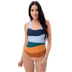 This Abstract Color Waves One-Piece Swimsuit offers a unique and stylish design, perfect for any beach or pool day. Made with high-quality material, this swimsuit provides comfort and durability. Its abstract color wave pattern adds a pop of color to your swimwear collection. Enjoy the summer in style with this one-piece swimsuit. This one-piece swimsuit for all figures will bring out your best features. Enjoy the smooth fabric and the flattering design, and show it off by the sea or pool! • 82% Modern Summer Bodysuit, Modern Sleeveless Summer Swimwear, Modern Sleeveless Swimwear For Summer, Modern Fitted Swimwear For Beach, Summer Beach Color Block Bodysuit, Modern One-piece Swimwear For Pool, Modern Swimwear For Summer Pool, Multicolor Color Block Bodysuit For Pool, Modern Swimwear For Poolside And Summer