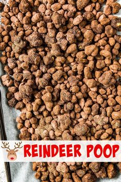 a pile of reindeer poop on top of a sheet of paper with the words reindeer poop over it