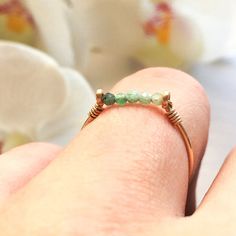 Handmade May Birthstone Stackable Rings As Gift, Handmade Adjustable Minimalist Birthstone Ring, Handmade Minimalist Adjustable Birthstone Ring, Handmade Dainty Birthstone Ring For Gift, Handmade Adjustable 14k Gold Crystal Ring, Hand Wrapped Toe Ring Jewelry For Gifts, Hand Wrapped Green Ring For Gift, Elegant Wire Wrapped Midi Rings As Gift, Elegant Wire Wrapped Midi Rings For Gift