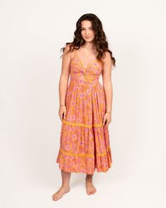 Light and breathable, 100% Rayon with lace trim. This dress is perfect for warm weather with adjustable spaghetti straps and a key-hole cut out. Beach Sundress With Lace Trim And Spaghetti Straps, Vacation Sundress With Lace Trim, Sleeveless Lace Trim Slip Dress For Vacation, Beach Sundress With Lace Trim, Spring Beach Slip Dress With Lace Trim, Beach Slip Dress With Lace Trim, Vacation Dresses With Lace Trim And Spaghetti Straps, Brunch Sundress With Lace Trim, Beach Cotton Midi Dress With Lace Trim