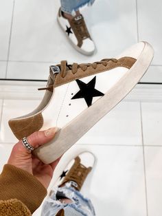 Your Favorite Neutral Star Sneaker

Make it a star-studded affair in these "Your Favorite Neutral Star Sneakers", comfy enough to take you from day to night with ease! Featuring a vegan blinded leather and an oh-so on-trend cognac brown hue, plus a rubber outsole, lace up closure, and a black star on the sides, these sneaks will make sure you're always looking stellar. Kandy, Smiles And Laughs, Lace Up Sneakers, Star Sneakers, Military Discounts, Black Star, Stylish Sneakers, Phoenix Az, Leather Lace