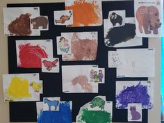 a bulletin board with different colored animals and pictures on it's side, along with other children's handprints