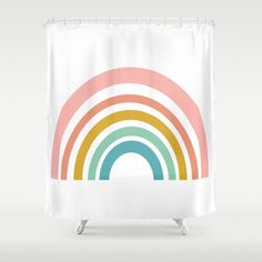 a shower curtain with a rainbow design on it