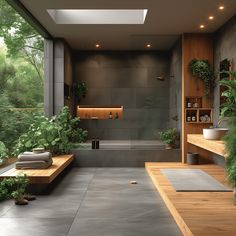 a modern bathroom with plants in the corner