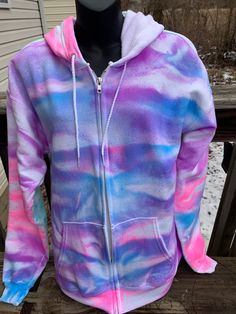 This comes from a customer who wanted a zip up instead of a hoodie. I think this tie dye zip up came out great!  This is what I love about my shop....I love when a potential customer messages me about custom orders and wants to know if I'm able to do certain colors or items.  Sometimes depending on the item or colors it makes me step out of my comfort zone, which is a good thing. We all need that in our life. :)  Each tie dye zip up is 60% cotton 40% polyester.  EverSoft Ring Spun Cotton Provides Premium Softness Wash after Wash Two-piece hood for a better fit and front pouch pocket for comfort and versatility Double-needle stitching on the neck and hems with shoulder-to-shoulder neck tape for comfort and durability Ribbed cuffs and waistband that hold their shape.  Customers say this zip Trendy Tie Dye Sweatshirt For Winter, Trendy Tie Dye Sweatshirt For Streetwear, Trendy Tie Dye Hoodie For Winter, Trendy Tie Dye Cotton Sweatshirt, Trendy Cotton Tie Dye Sweatshirt, Trendy Tie Dye Hoodie For Streetwear, Trendy Tie Dye Winter Hoodie, Trendy Tie-dye Sweatshirt For Winter, Trendy Tie-dye Hoodie For Winter