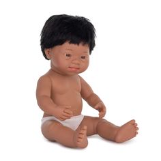 a baby doll sitting on the ground wearing a diaper and looking at the camera