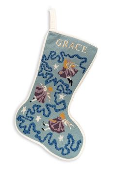 an embroidered christmas stocking with the words grace on it