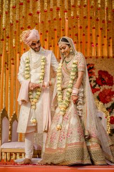 couple after a jaimala Orang India, Indian Bride Outfits, Indian Wedding Couple, Indian Wedding Photography Poses, Wedding Outfit Men