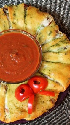 a plate with some bread and sauce on it