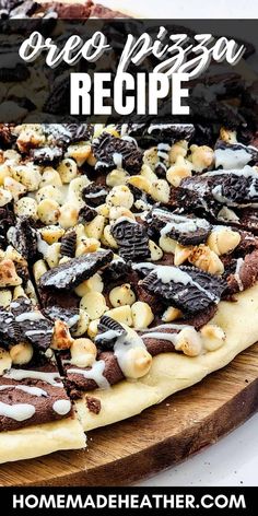 a homemade oreo pizza is shown on a cutting board with the words oreo pizza recipe above it