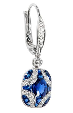 These 18-karat gold earrings deliver vintage-inspired style with an elegant argyle pattern in blue sapphires and fiery diamonds. 1" drop; 1/2" width Lever-back closure Total diamond weight: 0.35ct. Total sapphire weight: 0.38ct. Color: G-H Clarity: VS1-VS2 18k gold/sapphire/diamond Made in the USA >Diamond Guide Argyle Diamonds, Argyle Pattern, Diamond Guide, Blue Sapphire Diamond, Diamond Star, Women Diamond, Diamond Drops, Diamond Drop Earrings, Sapphire Diamond