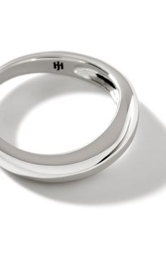 A mirror-shine finish completes this sleek, minimalist ring band cast in timeless sterling silver. Sterling silver Imported Modern White Gold Signet Ring With Open Design, Minimalist Open Band Jewelry With Shiny Finish, Modern White Gold Open Signet Ring, Modern White Gold Open Dome Ring, Modern Sterling Silver Dome Promise Ring, Modern Jewelry With Polished Round Band, Modern White Gold Wide Band Ring In Sterling Silver, Classic White Gold Wide Band Ring With Open Band, Modern Wide Band Ring In White Gold Sterling Silver