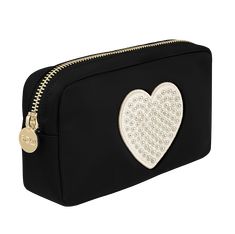 This classic Stoney Clover Lane design featuring an adorable beaded heart is the perfect travel accessory! Take this with you to organize your bag or you can use it as a makeup case. Either way, this playful black pouch will add a little bit of cheeriness to your everyday look! Dimensions: 9.5"W x 5"H x 2"D Materials: Nylon & Gold Hardware Lined Gold zipper at the top Black Pouch, Beaded Heart, Stoney Clover Lane, Stoney Clover, Makeup Case, Gold Zipper, You Bag, Travel Accessories, Black Noir