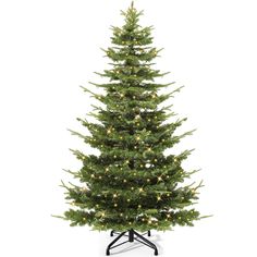 a green christmas tree with lights on it's branches and a black stand against a white background