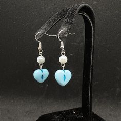 Glass Beads In A Dangle Earring. Made By Me, Never Worn. Handmade Blue Heart Drop Earrings, Blue Handmade Heart Drop Earrings, Blue Handmade Heart Dangle Earrings, Handmade Blue Heart Dangle Earrings, Handmade Blue Heart-shaped Beaded Earrings, Blue Dangle Heart Earrings With Heart Beads, Blue Heart-shaped Earrings With Ear Wire, Blue Heart Bead Earrings, Blue Heart-shaped Earrings With Heart Beads