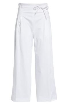 The label's signature sophistication shines in resort-ready trousers cut from stretch-enhanced cotton in a high-waisted silhouette with cropped wide legs. A slender bow ties the whole look together. 25" inseam; 24" leg opening; 14" front rise; 17" back rise (size 8) 97% cotton, 3% elastane Dry clean Made in the USA Designer Clothing Hispanic & Latinx Owned/Founded Elegant Cotton Culottes, Elegant High-waisted Cotton Culottes, White Cotton Wide Leg Culottes, Cropped Wide Leg Trousers, Hairstyling Products, Led Fashion, Rollerball Perfume, Beauty Services, Beauty Sale