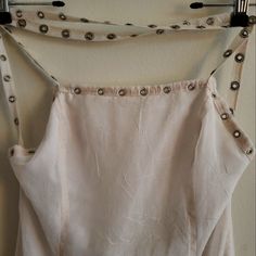 Super Rare And Vintage Lip Service Halter Dress. White / Creamish Flowy Dress - So Pretty! High Low Hemmed And Is Lined About To Mid/Upper Thigh. Studded Detail On Straps Continue To Low Back. Tagged A Medium. Material Has Some Stretch But Not A Lot. Armpit To Armpit: 34in Waist:28-29in Hip:34-36in Length: Neckline Down - 35in; From Low Back Down - 42in Lip Service Dress, Halter Dress White, Vintage Lip Service, Vintage Sundress, Lip Service, Spring Style, Flowy Dress, Hem Dress, High Low Hem