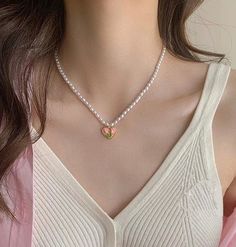 Introducing our stunning pink tulip pendant pearl beaded necklace choker, the perfect statement piece to elevate any outfit! Handcrafted unique design features a delicate pink tulip pendant, complemented by lustrous faux pearl beads for a touch of elegance and sophistication. This beautiful necklace is the perfect accessory for any occasion, whether it's a romantic dinner date, a night out with friends, or a special event. The floral design is perfect for spring and summer, adding a touch of feminine charm to your wardrobe. Don't miss out on this must-have accessory for the season! Order now and enjoy the compliments that come with wearing this gorgeous piece. With our limited time sale, there's no better time to treat yourself or someone special to this stunning necklace. 💎 Features: ♥ H Pink Pearl Necklace With Heart Beads, Valentine's Day Pink Beaded Necklaces, Pink Heart-shaped Pearl Necklace, Heart-shaped Pink Pearl Necklace, Pink Pearl Necklace For Valentine's Day, Valentine's Day Pink Pearl Charm Necklace, Valentine's Day Pink Pearl Necklace, Tulip Necklace, Floral Statement Necklace