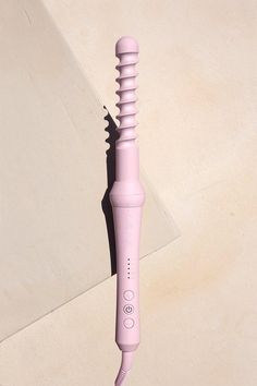 Amp up the ultimate hair volume with our Go Easy Curl Wand.
Designed with a spiral twist ceramic coated barrel to create prominent curls with XXL bounce and a voluminous finish, the Go Easy Curl wand is your new go-to in achieving a beachy textured finish to your hairstyle in minutes.
Featuring a guided 25mm attachment to style hair effortlessly without the fuss. Create long-lasting and tousled curl results at home without the salon price tag!
Attach our Go Easy Curl Wand to your First Base handle to create perfect uniform curls with so much bounce and volume every time. With its super fast heat mechanism reaching a top temperature of 220°C in 60 seconds, so you can spend more time on your hair glam! 
Weight: 112g
Dimensions: 25mm
Material: Ceramic Coated
Attachment: Click & Twist
Temperat Curl Wand, Hair Glam, Easy Curls, Summer Hair Trends, Wand Hairstyles, How To Get Thick, Tight Curls, Queen Hair, Defined Curls