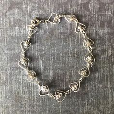 7.25 Inches Spring Ring Clasp Silver And Hearts Bracelet Never Worn. Cheap Vintage Silver Bracelets, Nickel Free Silver Vintage Heart Bracelet, Vintage Silver Bracelet With Heart Charm, Nickel-free Vintage Heart Bracelet As Gift, Nickel-free Silver Vintage Heart Bracelet, Glam Jewelry, Heart Pendant Diamond