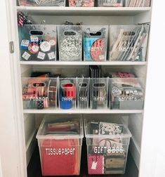 an organized closet with plastic bins filled with craft supplies