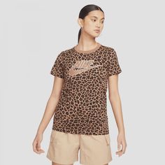 Style No. DN5872-256 Color: Archaeo Brown Loose fit for a roomy feel. 100% cotton. Nike Sportswear Women's Leopard Print Tee. Women's Flight Suits, Nike Air Women, Jordan Essentials, Nike Sportswear Women, Flight Suit, Running Shorts Women, Nike Flyknit, Red Nike, Fleece Shorts