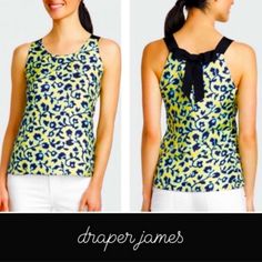 Draper James 100% Silk Sleeveless Tank Blouse Womens Size 8 (M) Like New Without Tags No Visible Signs Of Wear Gorgeous Vivid Yellow & Two-Tone Blue Floral Print Allover Solid Navy Neck/ Sleeves Adorable Bow Tie On Back *Mini Snap Under The Bow Reveals A Small Keyhole For Easier On/ Off! 100% Silk Dry Clean Only Bust: 18.5" Length: 25" Fitted Yellow Sleeveless Camisole, Stretch Yellow Sleeveless Camisole, Yellow Stretch Sleeveless Camisole, Yellow Stretch Camisole Tank Top, Yellow Sleeveless Cotton Camisole, Yellow Cotton Sleeveless Camisole, Yellow Sleeveless Camisole For Spring, Sleeveless Green Top For Daywear, Green Sleeveless Top For Daywear