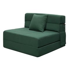 a green couch with two pillows on it's back and the seat folded down