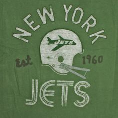 new york jets t - shirt with football helmet and plane on the front in green