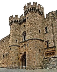 an old stone castle with many windows