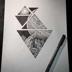 a pencil drawing of mountains and stars in the night sky, with a pen resting on top